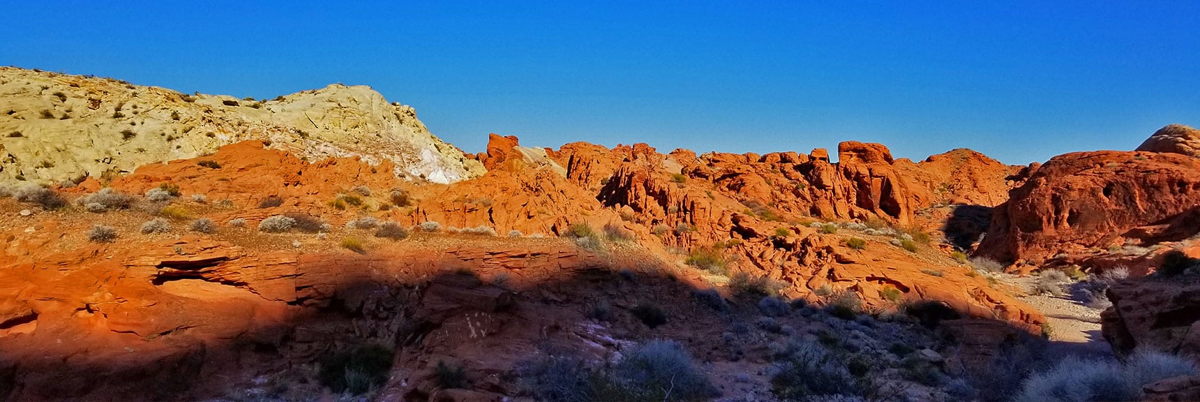Contrasting Red and White Rock Formations in the Northern Portion of Prospect Trail in Valley of Fire State Park, Nevada