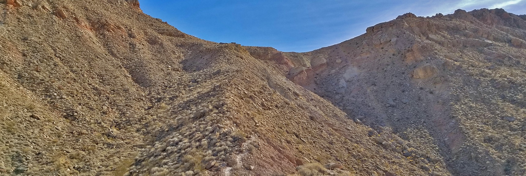 Ascending a Ridge Toward a Spectacular Bowl of Fire Overlook | Anniversary Narrows | Muddy Mountains Wilderness, Nevada