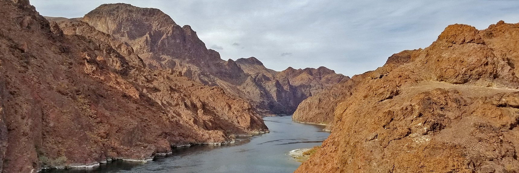 Colorado River Upstream View. Trail Skirted Cliffs on Right. | Arizona Hot Spring | Liberty Bell Arch | Lake Mead National Recreation Area, Arizona