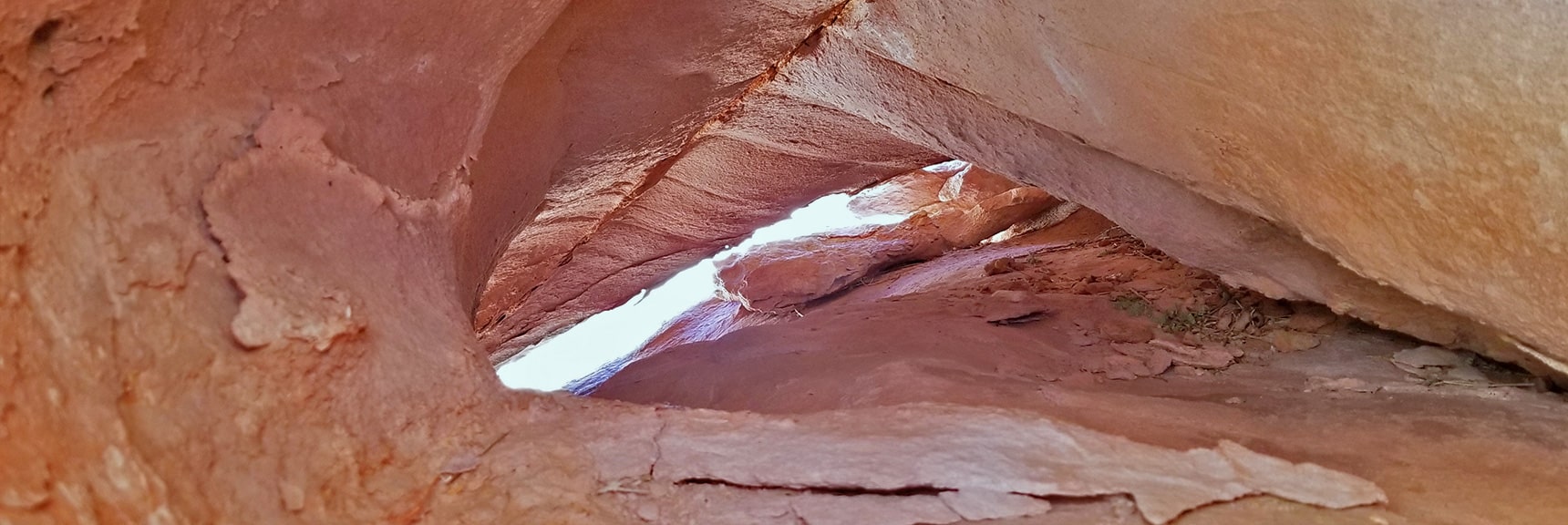 Intricate Openings in Jurassic Era Aztec Red Rock: "Light at the End of the Tunnel" | Bowl of Fire, Lake Mead National Recreation Area, Nevada