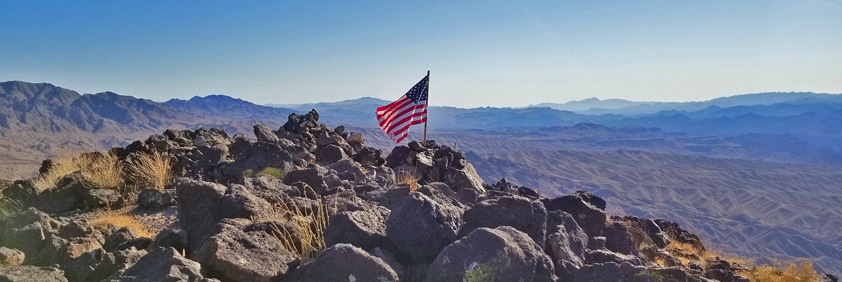 Flag Waving in the Wind on Fortification Hill Summit | Fortification Hill | Lake Mead National Recreation Area, Arizona