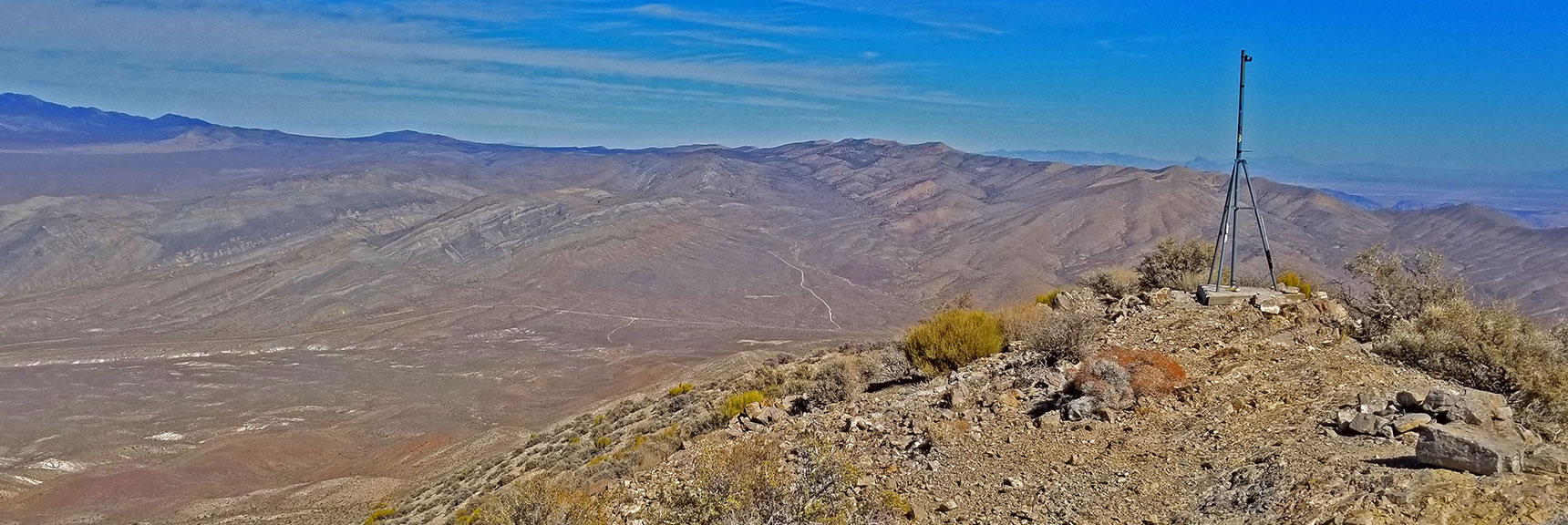 View Northeast. Gass Peak Road Seen in Valley Below. | Gass Peak Grand Crossing | Desert National Wildlife Refuge to Centennial Hills Las Vegas via Gass Peak Summit by Foot