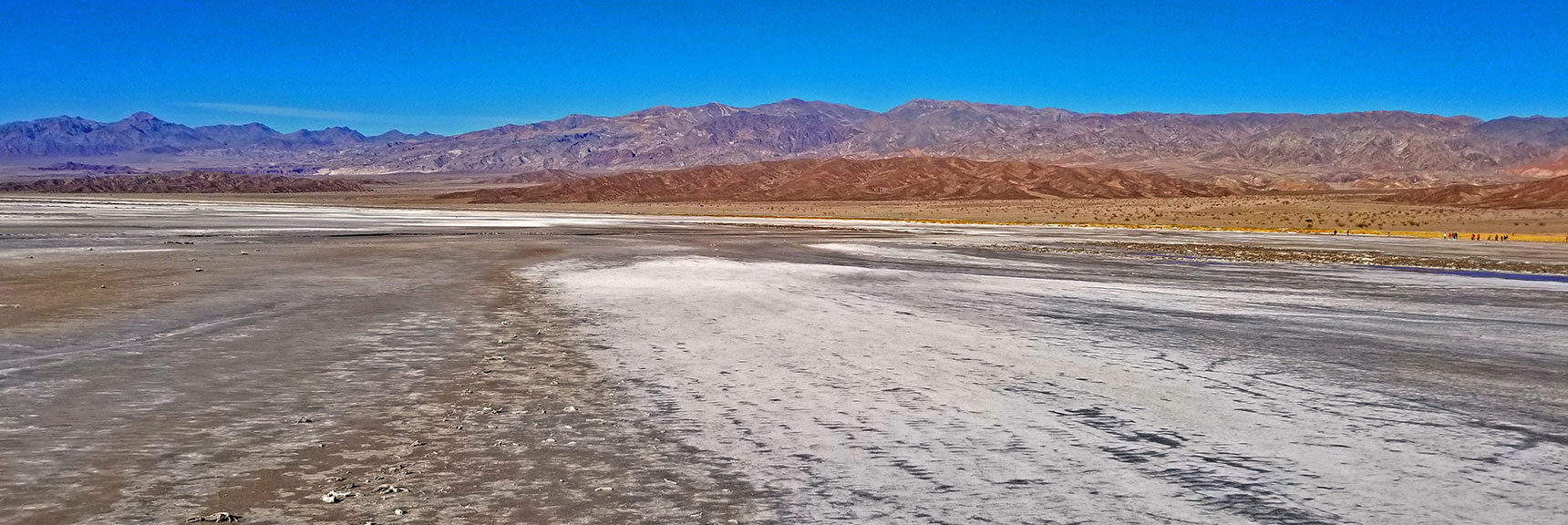 The Various Colors in the Landscape Stand Out Brilliantly in the Sunlight. | Return of Lake Manly (Lake in Death Valley) | Death Valley National Park, California