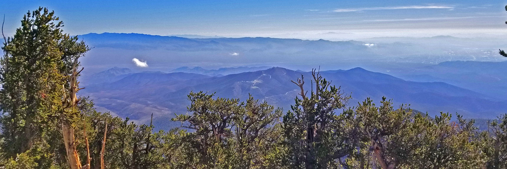 View Toward Angel Peak, Las Vegas Valley, Sheep Range and Gass Peak. | Grand Circuit Loop Cougar Ridge Trail, Mummy Mountain Knees | Mummy Mountain Toe | Mummy Springs | Raintree | Fletcher Peak | Mt Charleston Wilderness | Spring Mountains, Nevada