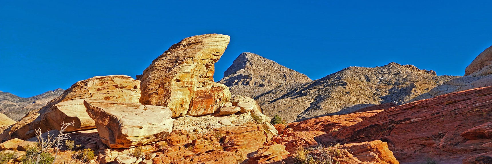 Turtlehead Peak Framed by One of the Sandstone Formations on Calico Tanks Trail | Calico Tanks | Red Rock Canyon National Conservation Area, Nevada
