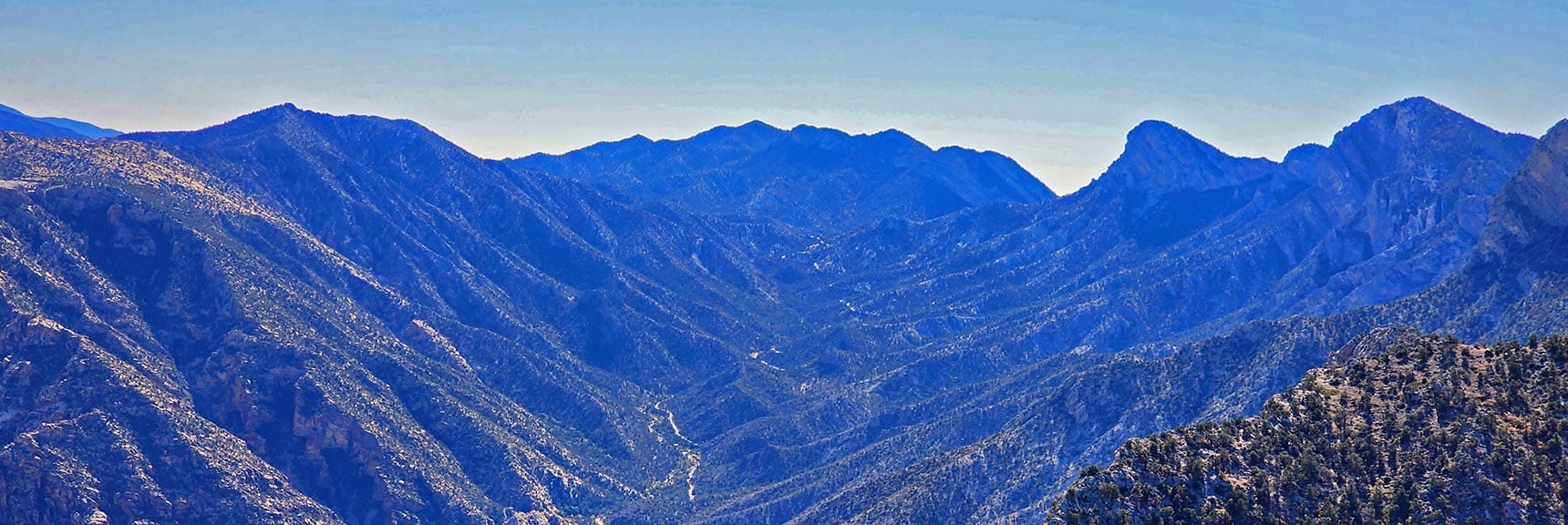Rocky Gap Road. Keystone Thrust (Right), Rainbow Mts (Left), Potosi Mt Background | Keystone Thrust West Summit Above White Rock Mountain | La Madre Mountains Wilderness, Nevada