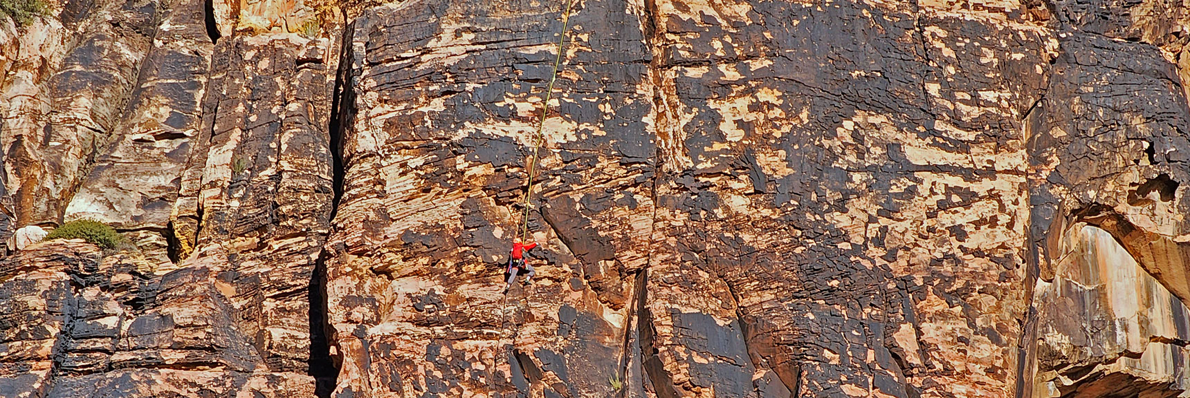 Rock Climber Ascending Mescalito Pyramid Vertical Cliffs. | Rock Climber Observations | Pine Creek Canyon | Rainbow Mountain Wilderness, Nevada