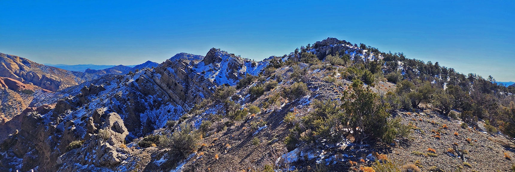 Section of Ridgeline Heading South. Hug the Upper Right Edge of Cliffs. | Mid Upper Crest Ridgeline | Rainbow Mountain Wilderness, Nevada