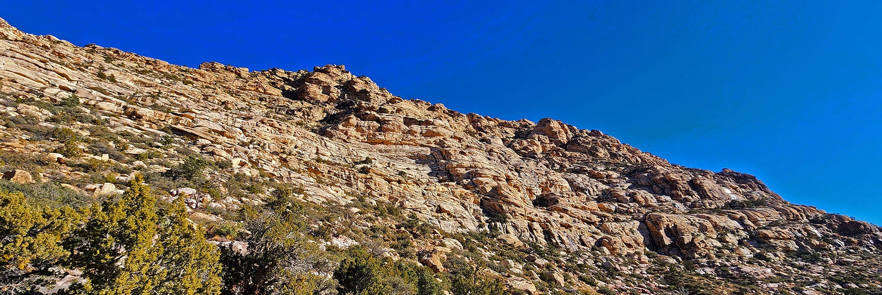 Rounding Western White Rock Mountain, Now in Red Rock Canyon NCA | White Rock Mountain Loop Trail | Red Rock Canyon, Nevada