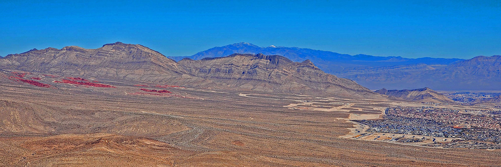 Little Red Rock (Left); Summerlin Ridge and Urban Expansion (Center); Sheep Range (Background) | Eastern Outer Circuit | Blue Diamond Hill | Red Rock Canyon, Nevada