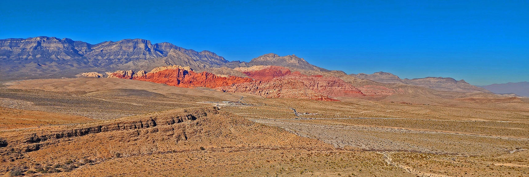 Equestrian Loop Ridge with Calico Basin Background. Calico Hills, Kraft Mt, Damsel Peak | Eastern Outer Circuit | Blue Diamond Hill | Red Rock Canyon, Nevada