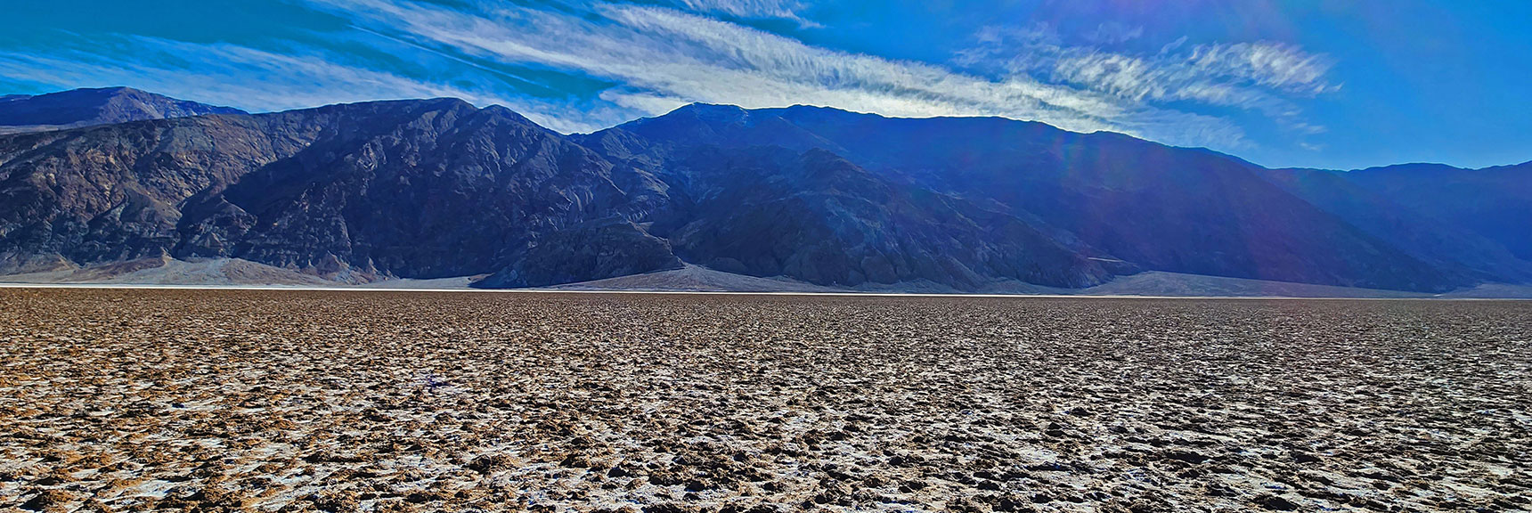 View Back Toward Black Mountains. Surface Dark, Firm, Jagged. | Death Valley Crossing | Death Valley National Park, California | David Smith | LasVegasAreaTrails.com