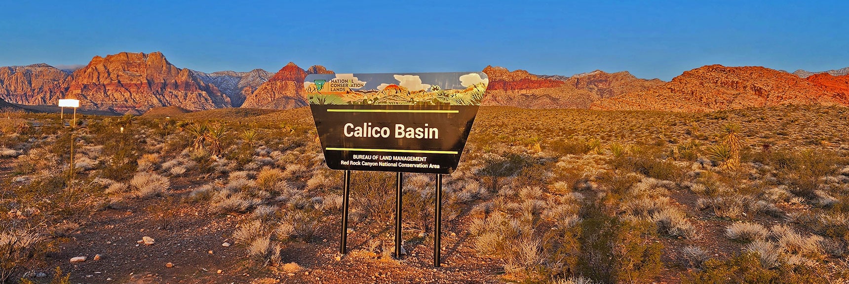 Calico Basin Entrance Sign with Rainbow Mountains as Backdrop | Ash Canyon to Calico Tanks | Calico Basin and Red Rock Canyon, Nevada | David Smith | Las Vegas Area Trails