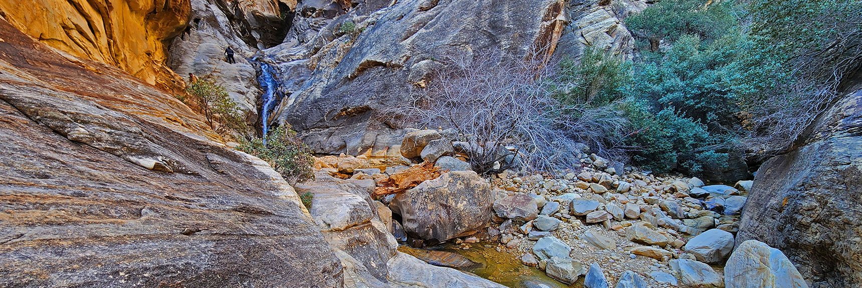 Closer View of Lower Waterfall from Approach Ledge. Note Hikers Left of Fall | Ice Box Canyon | Red Rock Canyon NCA, Nevada | Las Vegas Area Trails | David Smith