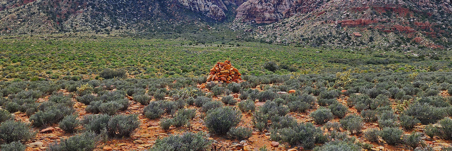 Closer View of That Cairn. Large Rocks Stacked About 6 Feet High. | Historic Roads in Red Rock Canyon, Nevada | David Smith | LasVegasAreaTrails.com