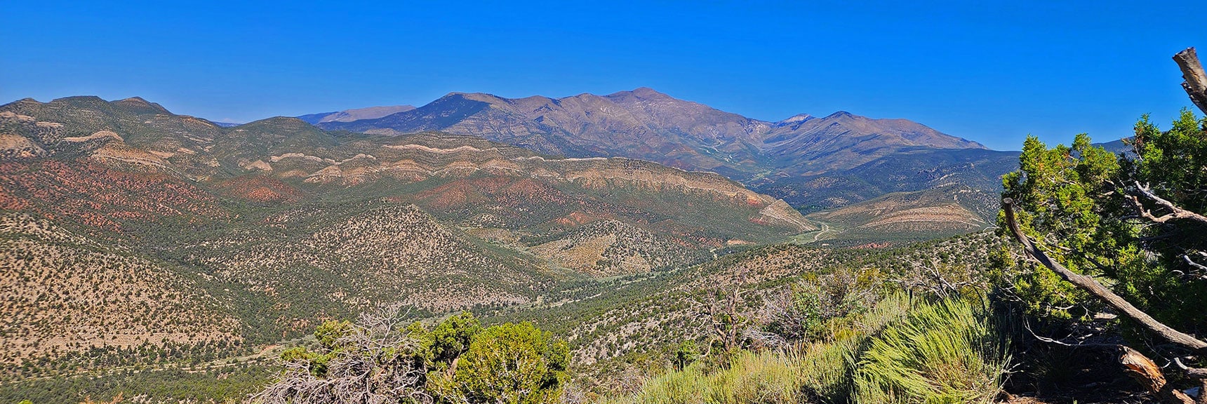 Sexton Ridge Descends from Griffith Peak (left); Wilson Ridge Descends from Harris Mt. (right). | Red Rock Summit | Lovell Canyon & Rainbow Mountain Wilderness, Nevada