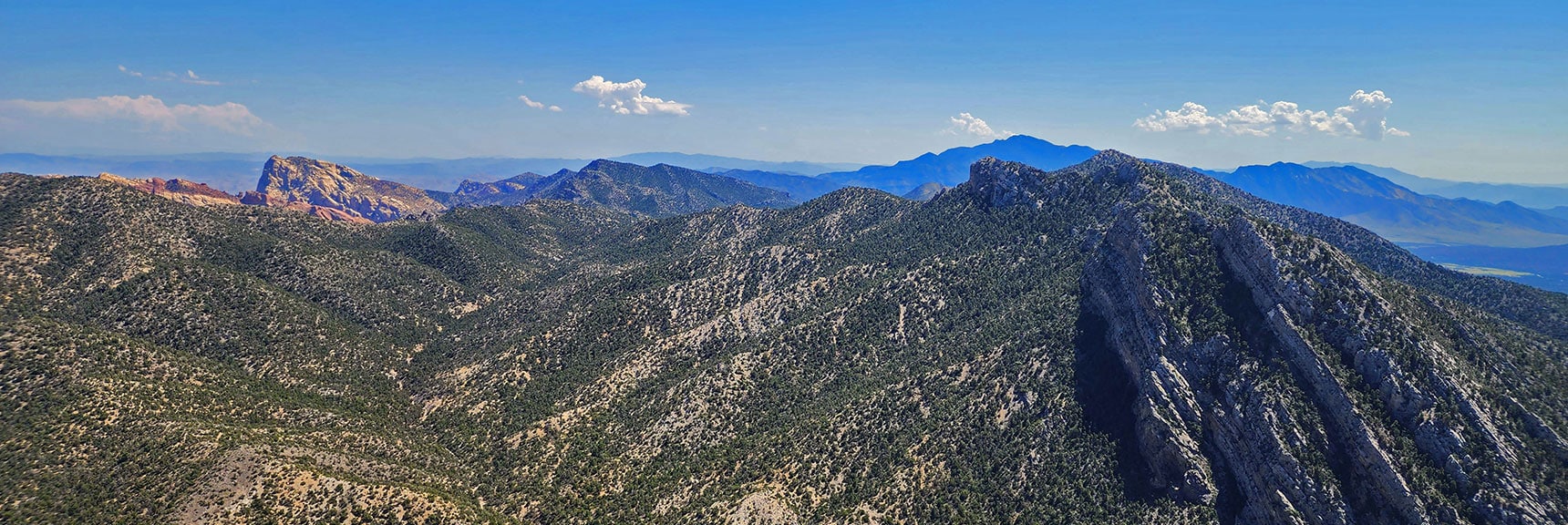 View South Along Wilson Ridgeline to Distant Potosi Mt., South End of Spring Mountains. | Red Rock Summit | Lovell Canyon & Rainbow Mountain Wilderness, Nevada