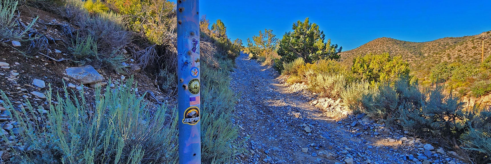Stickers on Post Identify Types of Vehicles Made for Rocky Gap Road | Rocky Gap Rd to Bridge Mt Trailhead | Lovell Canyon, Nevada