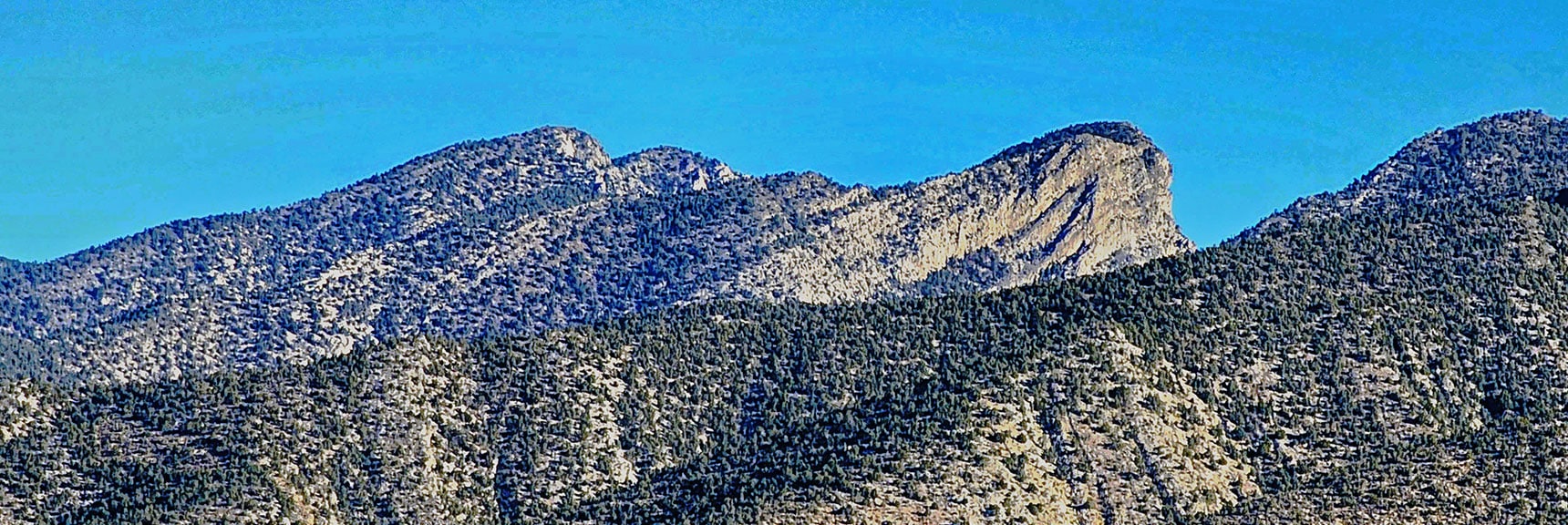 I Call This Cliff "Knife's Edge Pinnacle", Towering Above Bridge Mt. Trailhead on Rocky Gap Rd. | Landmark Bluff Circuit | Lovell Canyon, Nevada