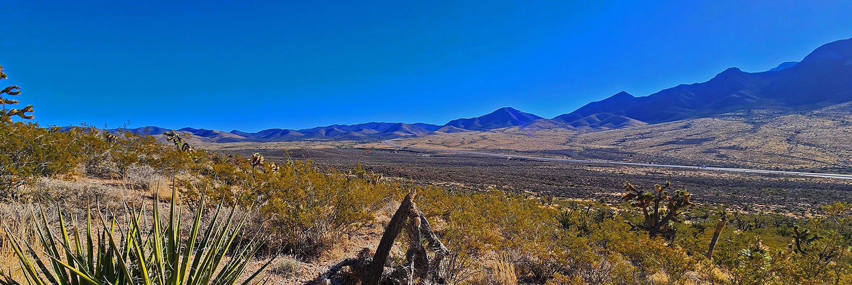 View Southeast Up Highway 160 to Rainbow Mts. Ridgeline and Potosi Mt. Area. | Landmark Bluff | Lovell Canyon, Nevada