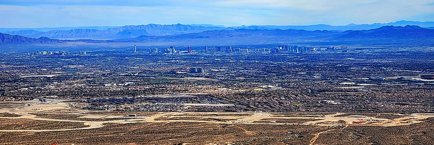 Vegas Strip with Arizona Black Mts. Background Across Lake Mead | Damsel Peak Southeastern Slope | Calico & Brownstone Basins, Nevada