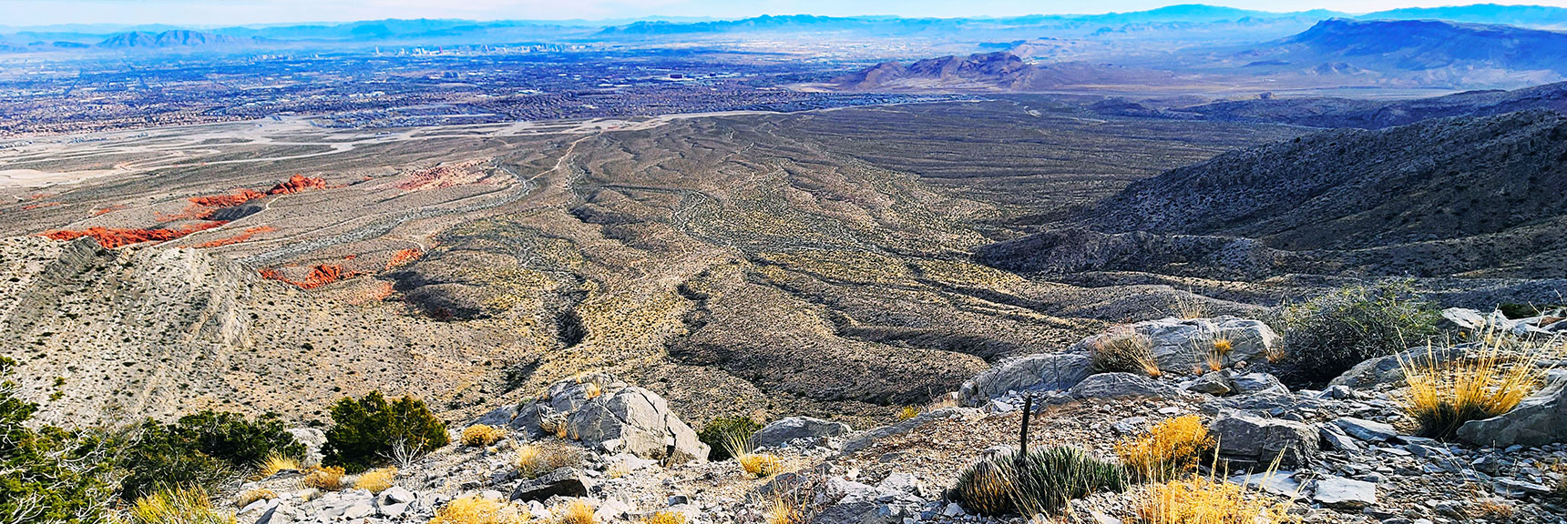 View South Over Ledge. Sheer 500ft+ Cliff Over Edge. | Damsel Peak Southeastern Slope | Calico & Brownstone Basins, Nevada