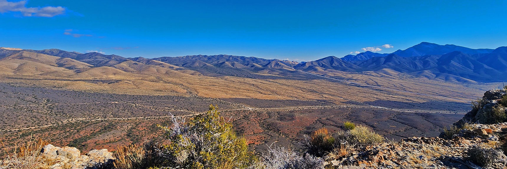 Potosi Mt. (right); Rainbow Mts. Upper Crest Ridgeline Stretches North (to Left). | Landmark Bluff Summit | Lovell Canyon, Nevada