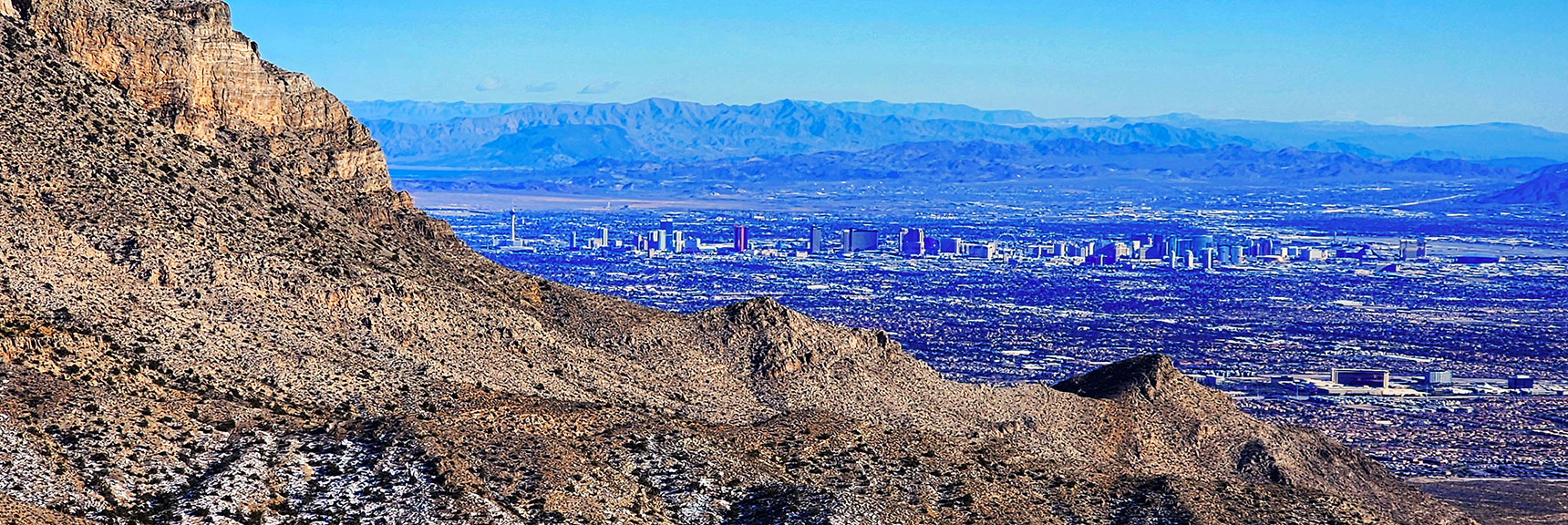 Las Vegas Strip Seen in Distant View Down Brownstone Basin. | 3 Basin Circuit | Calico Basin, Brownstone Basin, Red Rock Canyon, Nevada